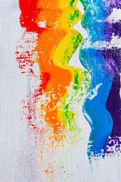 Several strokes of multi-colored paint depict a frag of the LGBT community on Stock Photos