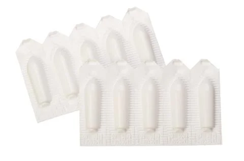 Several suppositories in blister Stock Photos