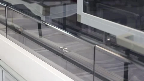 Several test tubes are moving on an assembly line at the donor center Stock Footage 304125931