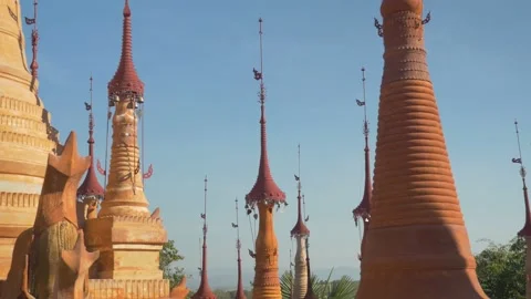 Several tops of Stupa temples with their Buddhist relics, in Myanmar Stock Footage 236740190
