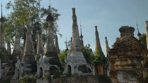 Several tops of Stupa temples with their Buddhist relics, in Myanmar Stock Footage 236741471