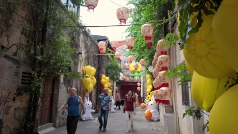 Several tourists can seen exploring Kwai Chai Hong 库存影片 316797385