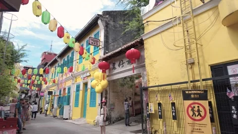 Several tourists can seen exploring Kwai Chai Hong 動画素材 317022497