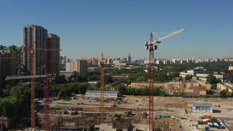 Several tower cranes in the process of building a new residential complex Stock Footage 156353275