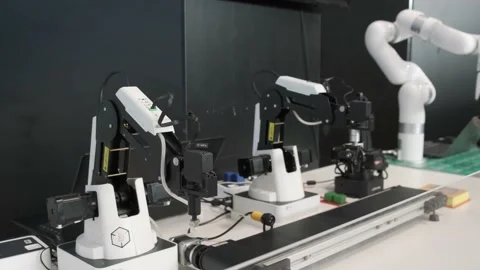 Several types of robotic arms to perform simple tasks. Stock Footage 233485337