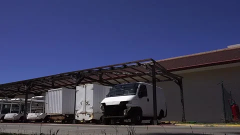 Several vehicles missing parts, as they are used for other vehicles when needed Stock Footage 306364434