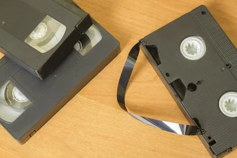 Several VHS videotapes on a light table Stock Photos