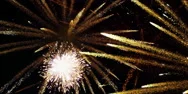 Several White And Gold Fireworks Burst, Raining Down Silver And Gold Sparks Stock Footage