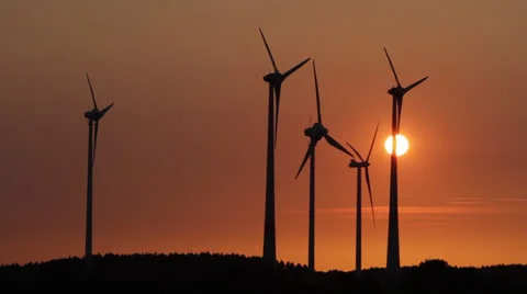 Several wind generators in sunset lighting Stock Footage 25613587