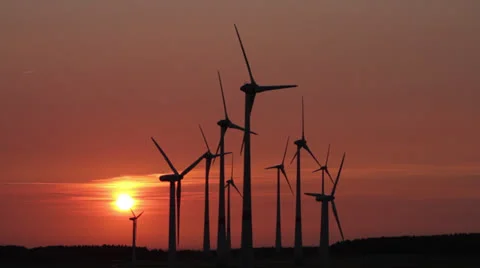 Several wind generators in sunset lighting Stock Footage 25615580