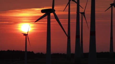 Several wind generators in sunset lighting Stock Footage 25618267
