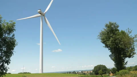 Several wind turbines in the fields, in the region of Auvergne, France Stock Footage 239079402
