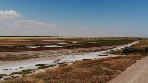 Several windmills represent environmentalism and alternative energy Stock Footage 126776769