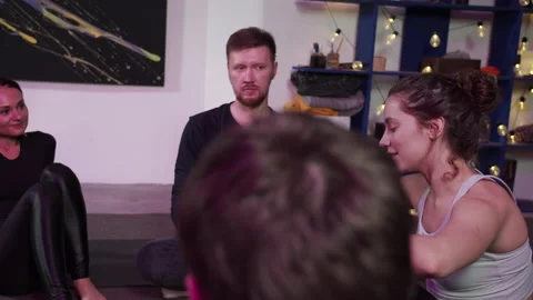 Several young people come to the training and talk before it starts Stock Footage 156241888
