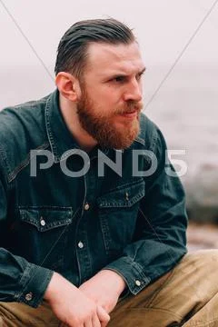Severe bearded man Stock Photos