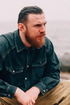 Severe bearded man Stock Photos