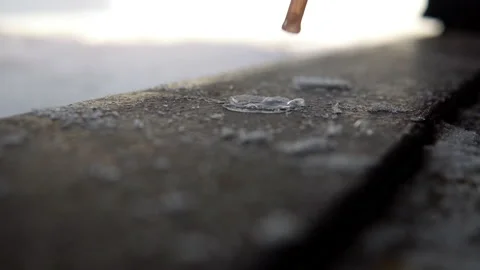 In severe frost, a soap bubble inflates through a tube and bursts Stock Footage 149221059