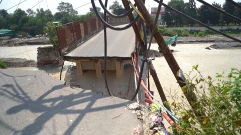 Severe road damage after monsoon flood in India Stock Footage 321041242
