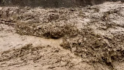 Severe Soil Erosion in Mountain Valley After Flash Flood Stock Footage 313345526