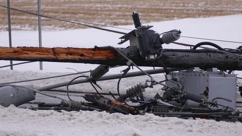 Severe spring ice snow freezing rain and wind storm takes down hydro poles Stock Footage 88565359