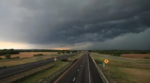 Severe storm &amp; dark clouds on an interstate highway Stock Footage 10579457