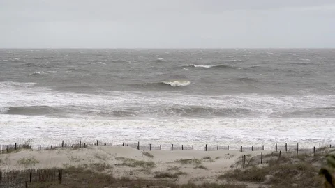 A severe storm with rough surf and rip tides on Amelia Island in Florida Video stock 129268696