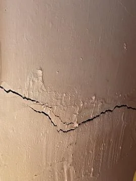 Severe Structural Crack On Masonry Side Wall Of Kitchen Countertop Base Stock Photos