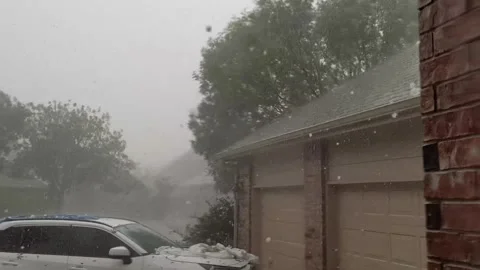 Severe Texas hailstorm, baseball-size hail pounds roof, breaks car windshield Vídeo Stock 241694476