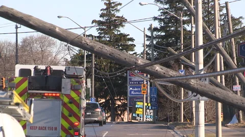 Severe thunderstorm and wind knocks down hydro poles and lines Stock Footage 61310444