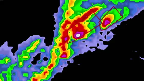 Severe thunderstorm approaching with tornado warning on weather radar screen Stock Footage 153128800