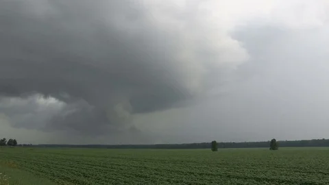Severe thunderstorm with rain wrapped tornado approaching Hawksville Canada Stock Footage 78691715
