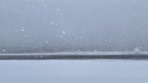 Severe winter snowstorm over rough sea with high waves during blizzard. Stock Footage 319146033
