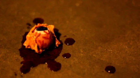 Severed eyeball on cement Stock-Footage 35753477