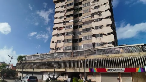 SevereView from structural cracks and facade damage on high-rise apartment Stock Footage 340916451