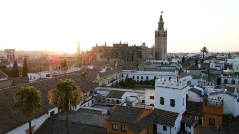 Seville, Andalucia, Spain - drone shot of the cityscape while sunset.	 Stock Footage