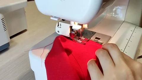 Sew clothes on a sewing machine Stock-Footage 158740873