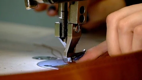 Sew the leather strap, sewing machine detail in slow motion Stock Footage 118136155