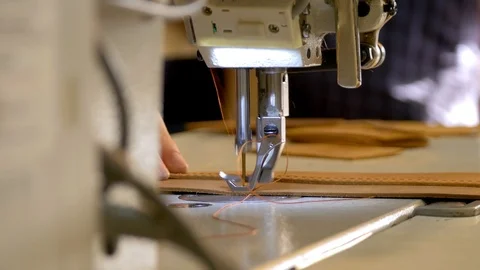 Sew leather wallet, sewing machine, leather workshop process Stock Footage 118135800