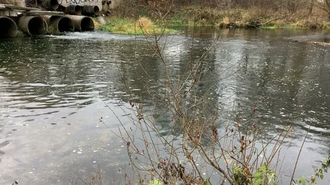 Sewage discharges into the river Stock Footage 120002865