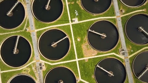 Sewage Farm: circular settling tanks - static, vertical aerial drone Stock Footage