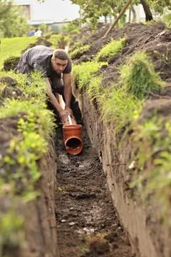 Sewer construction home Stock Photos