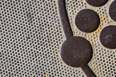 Sewer cover texture. Close-up background. Top view. Stock Photos
