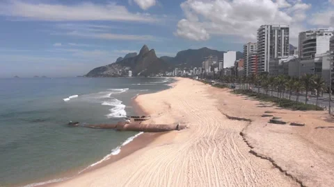 Sewer pipe exposed on empty Ipanema beach Stock Footage 131459260