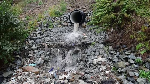 The sewer stream flowing from a pipe. 動画素材 80975639