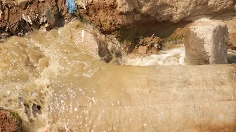 Sewer water flowing view, Close view of sewer water flowing Stock-Footage 148535486