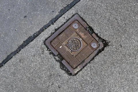 Sewerage hatch Fotos Stock
