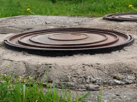 Sewerage hatch Fotos Stock