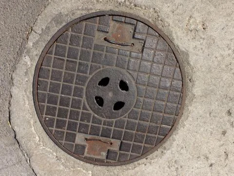 Sewerage hatch Fotos Stock