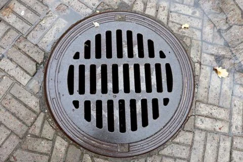 Sewerage hatch Fotos Stock