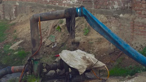 Sewerage water suction pipe and motor, Suction pipe dip in the sewerage Stock Footage 101565352